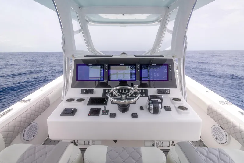 Slide: The Image of 2021 Front Runner 39 Center Console boat dashboard with ocean view. - 15
