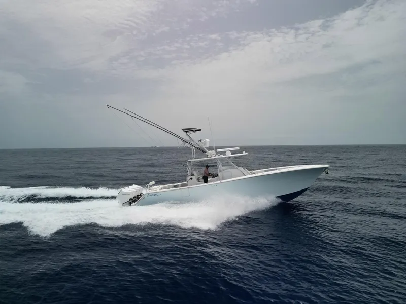 Slide: The Image of 2021 Front Runner 39 Center Console boat cruising on open ocean. - 26