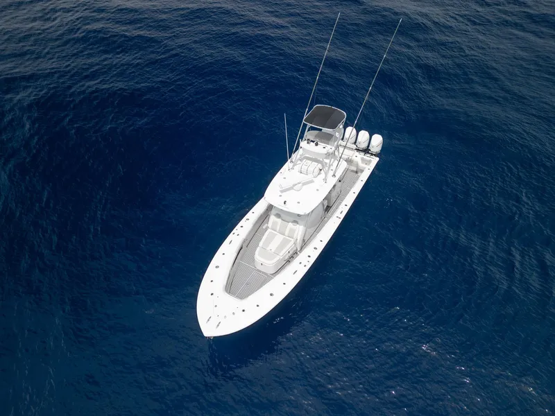 Slide: The Image of Aerial view of 2021 Front Runner 39 Center Console boat on open water. - 27