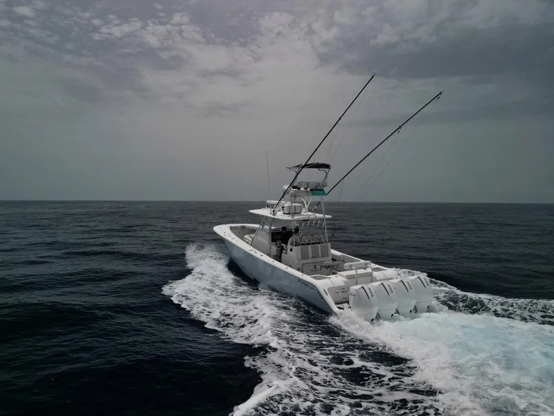 Slide: The Image of 2021 Front Runner 39 Center Console boat cruising on open ocean. - 31