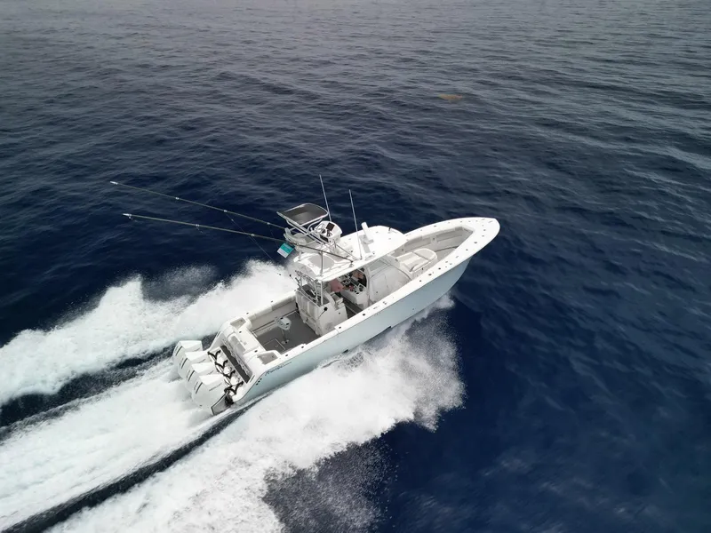 Slide: The Image of 2021 Front Runner 39 Center Console boat cruising on open ocean waters. - 4
