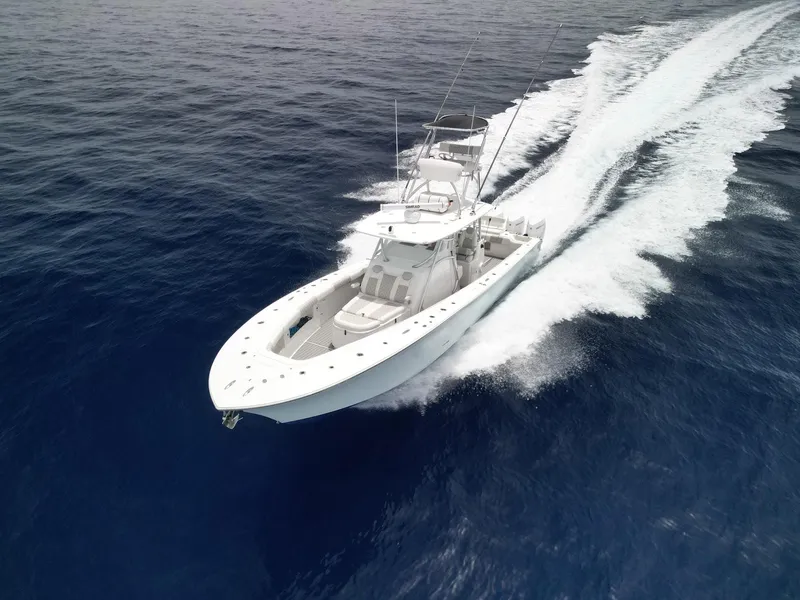 Slide: The Image of 2021 Front Runner 39 Center Console boat cruising on open ocean waters. - 5