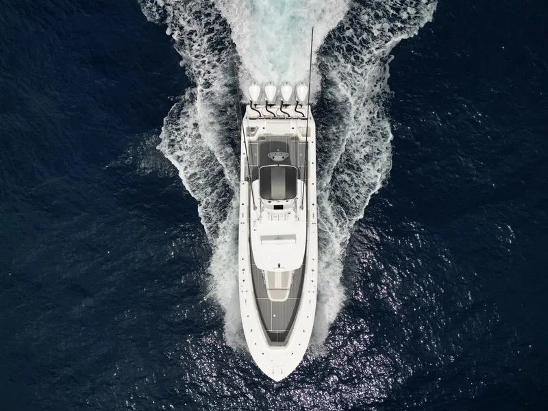 Slide: The Image of Aerial view of 2021 Front Runner 39 Center Console boat cruising on open water. - 7