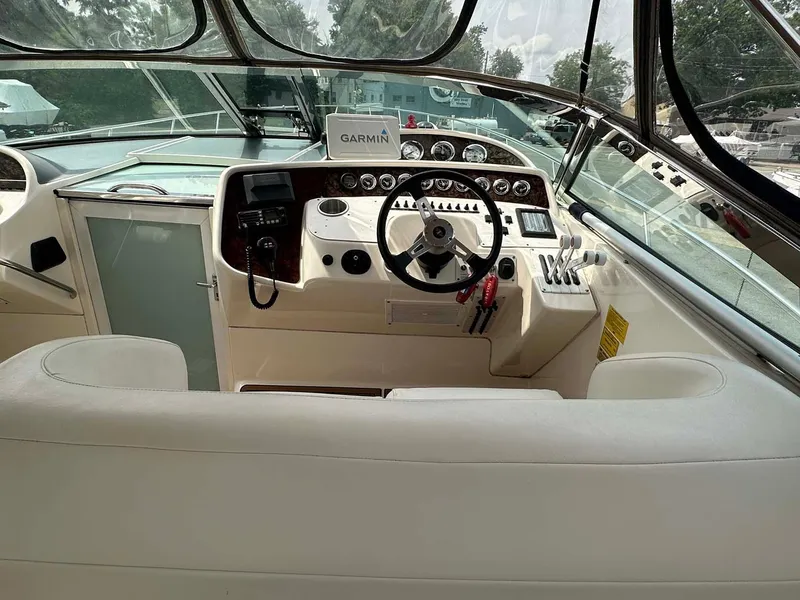 Slide: The Image of Interior cockpit of 1999 Wellcraft 45 Excalibur boat with Garmin navigation system. - 20