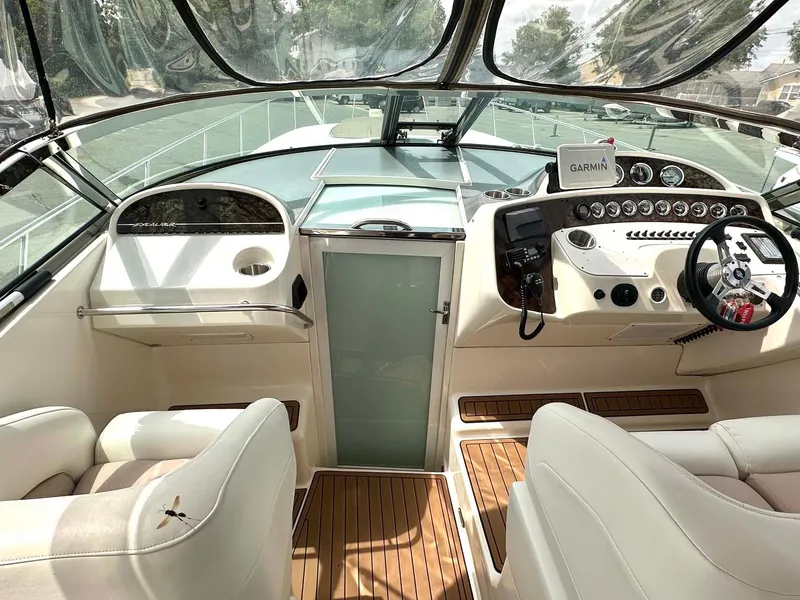 Slide: The Image of Interior of 1999 Wellcraft 45 Excalibur boat with modern dashboard and steering wheel. - 22