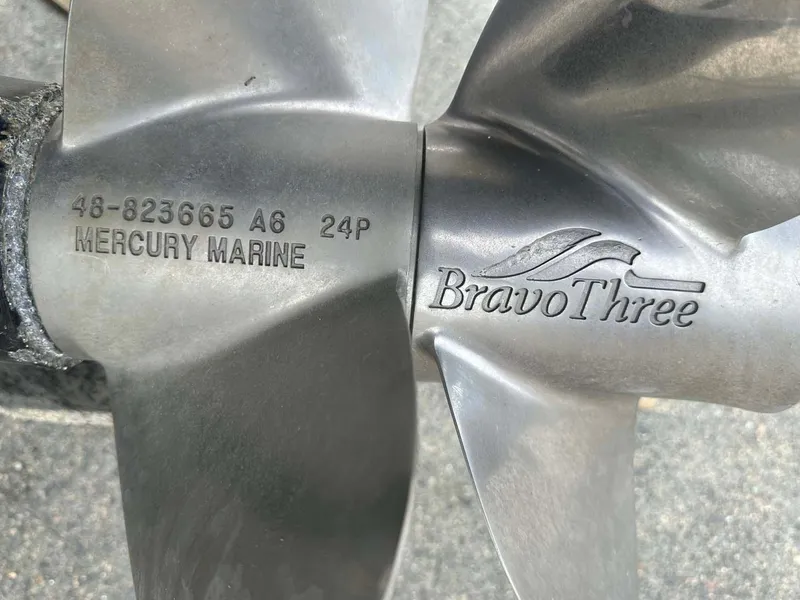 Slide: The Image of Mercury Marine Bravo Three propeller on 1999 Wellcraft 45 Excalibur boat. - 48