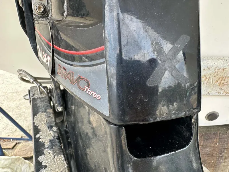 Slide: The Image of Close-up of a 1999 Wellcraft 45 Excalibur Bravo Three outdrive. - 49