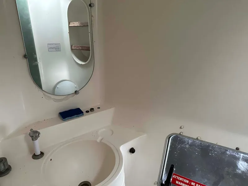 Slide: The Image of Bathroom interior of 1998 Fountaine Pajot Athena 38 catamaran with sink and mirror. - 19