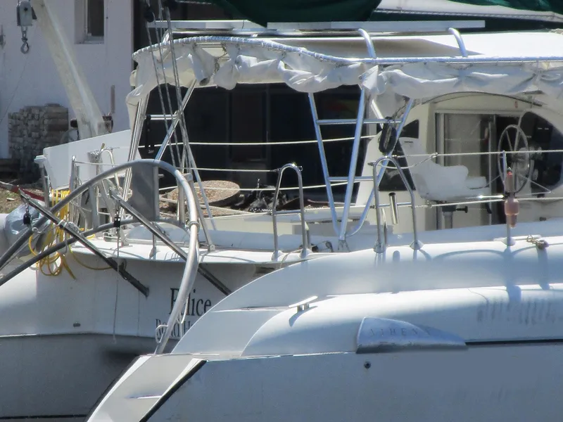 Slide: The Image of Fountaine Pajot Athena 38 catamaran, 1998 model, docked at a marina. - 25