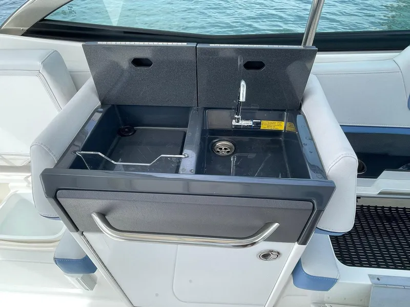 Slide: The Image of 2023 Formula 330 Crossover Bowrider OB boat sink and countertop detail. - 29