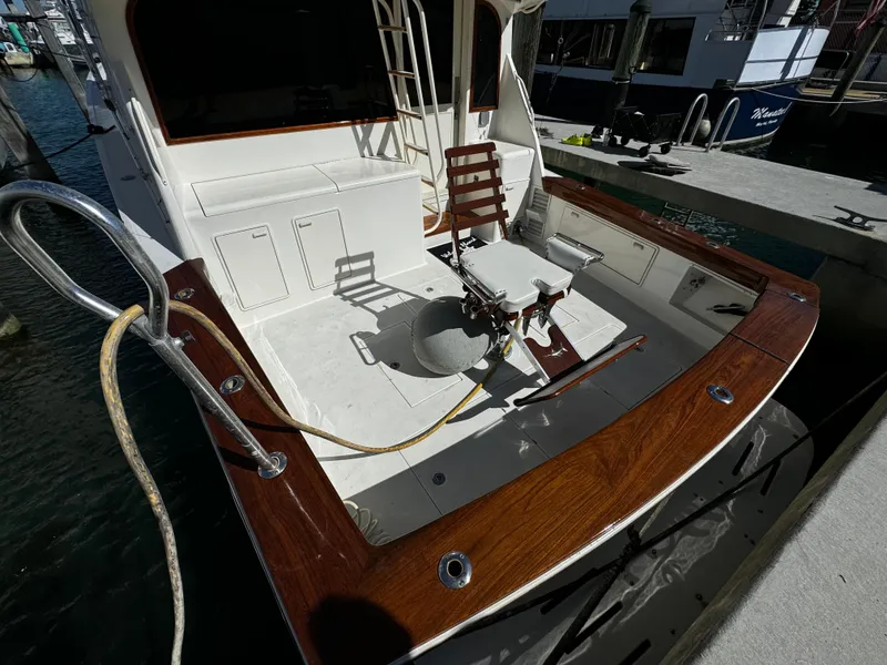 Slide: The Image of 1992 Ocean Yachts 48 Convertible fishing deck with chair and rod holders. - 41