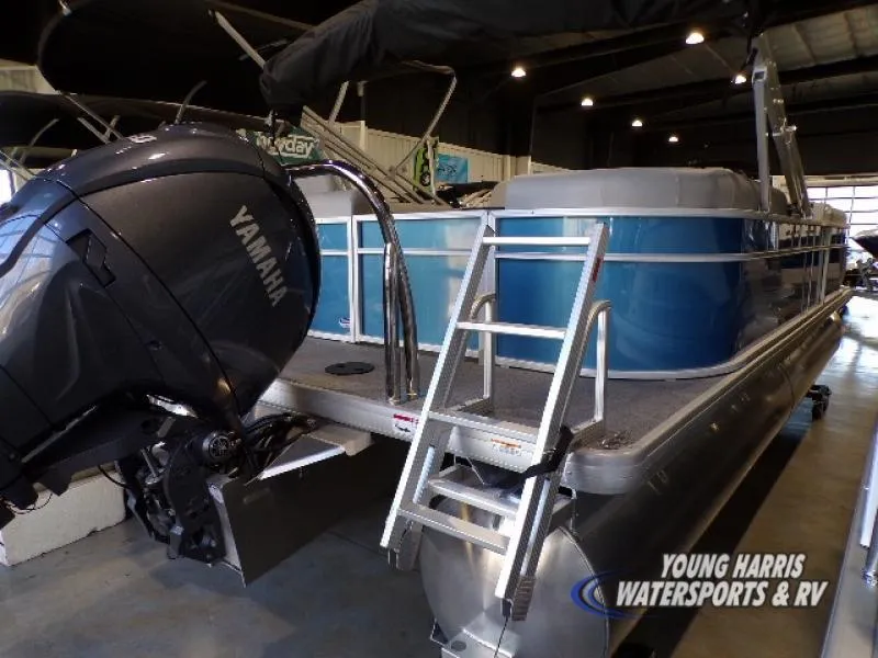 Slide: The Image of 2025 Godfrey EX2286SB pontoon boat with Yamaha engine in showroom. - 11