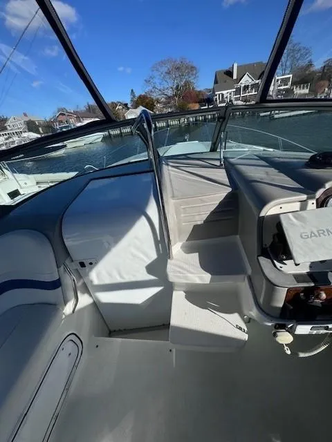 Slide: The Image of 2003 Formula 27 PC boat interior with helm and seating area. - 13
