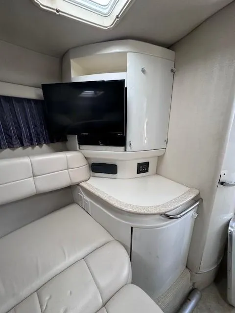 Slide: The Image of 2003 Formula 27 PC cabin interior with TV and seating area. - 19