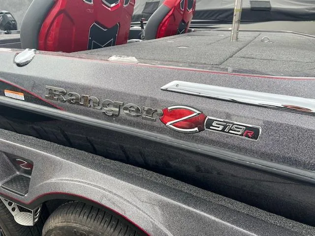 Slide: The Image of 2025 Ranger Z519R boat with red seats and sleek design. - 9