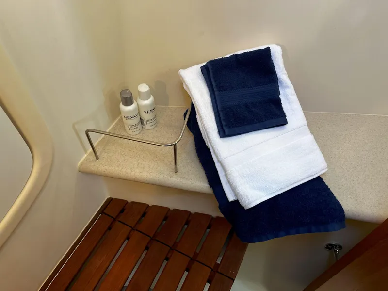 Slide: The Image of Towels and toiletries in the bathroom of a 2005 Hunter 41 yacht. - 46