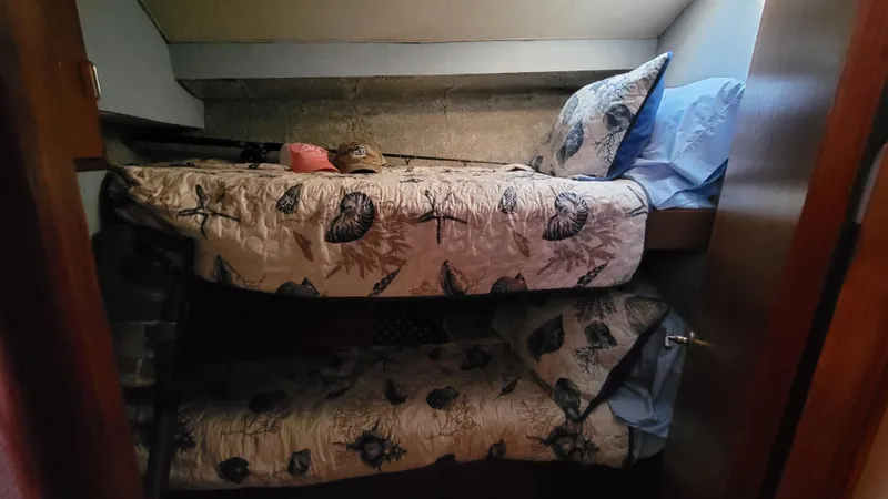 Slide: The Image of Cozy bunk beds in 1988 Ocean Yachts 38 Super Sports cabin. - 19