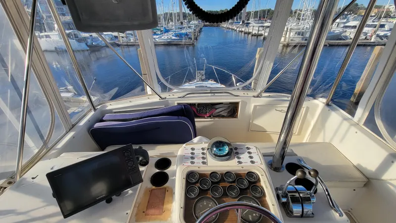 Slide: The Image of Cockpit view of 1988 Ocean Yachts 38 Super Sports at marina. - 33