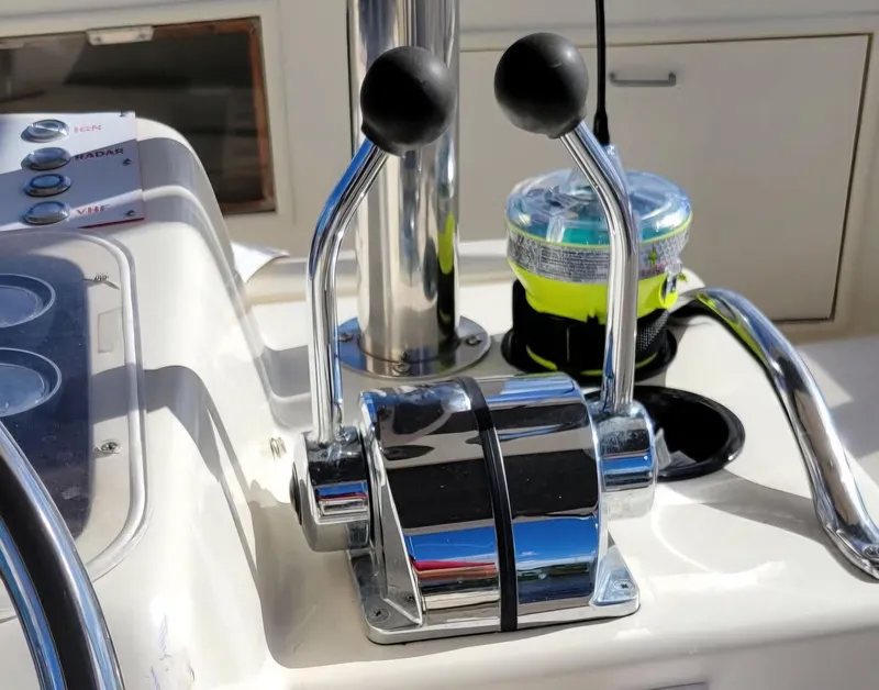 Slide: The Image of Close-up of 1988 Ocean Yachts 38 Super Sports throttle controls on a boat dashboard. - 36