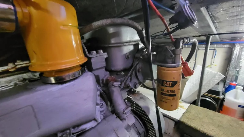 Slide: The Image of Engine room of 1988 Ocean Yachts 38 Super Sports with CAT filter visible. - 44