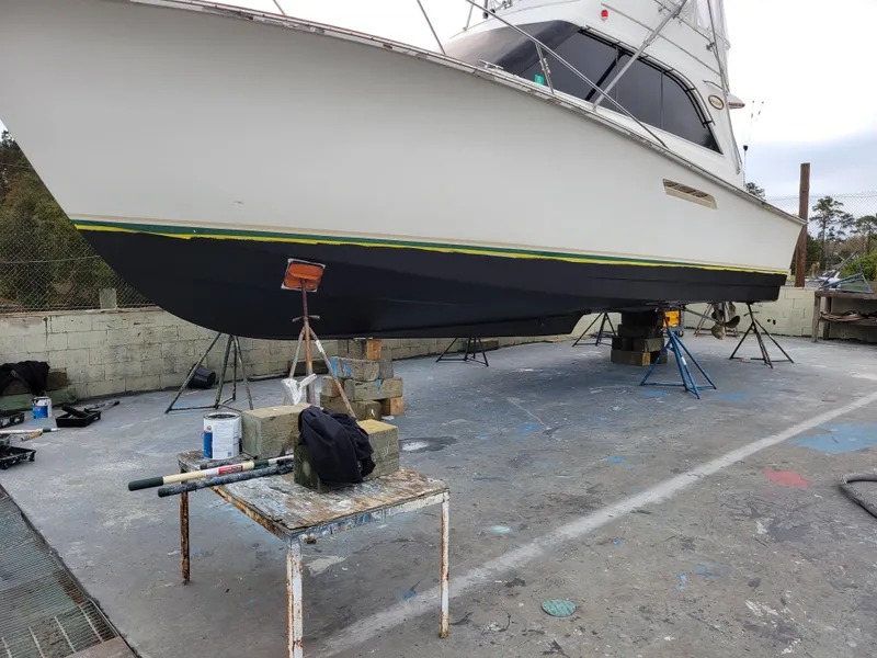 Slide: The Image of 1988 Ocean Yachts 38 Super Sports on dry dock for maintenance. - 45