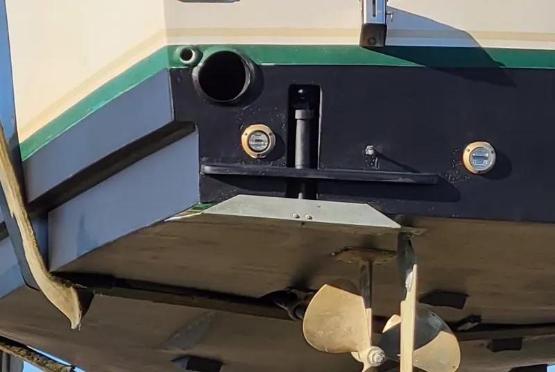 Slide: The Image of 1988 Ocean Yachts 38 Super Sports boat stern with propeller and hull details. - 46