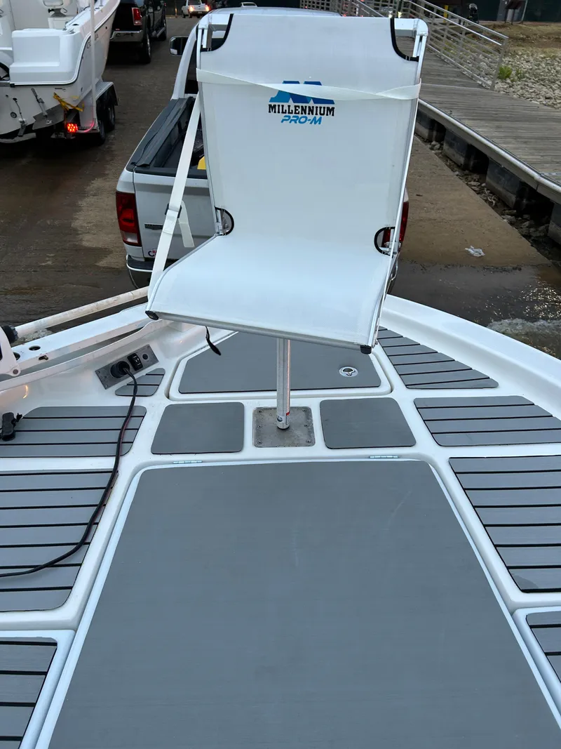 Slide: The Image of 2013 Epic 22 SC boat with Millennium Pro-M fishing chair on deck. - 14