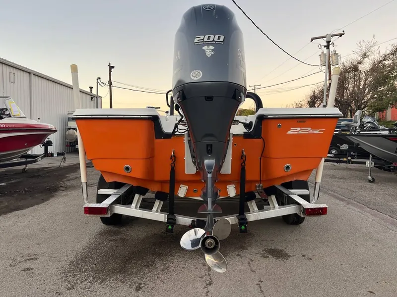 Slide: The Image of Orange 2013 Epic 22 SC boat with 200 HP engine on trailer. - 20