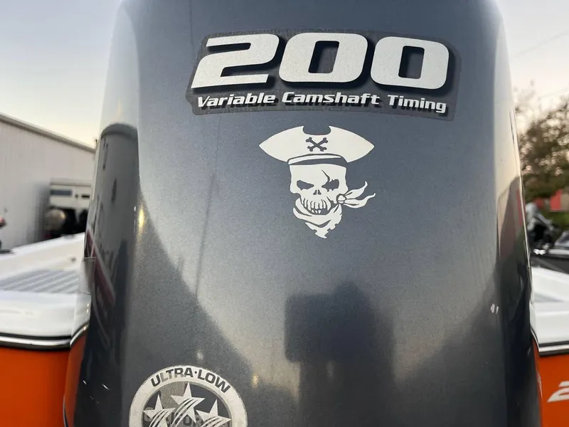 Slide: The Image of 2013 Epic 22 SC boat engine with pirate skull decal and "200 Variable Camshaft Timing" label. - 29
