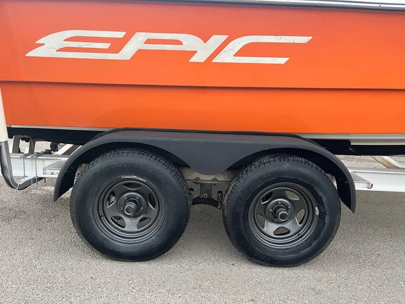 Slide: The Image of Orange 2013 Epic 22 SC boat on trailer with dual wheels. - 34
