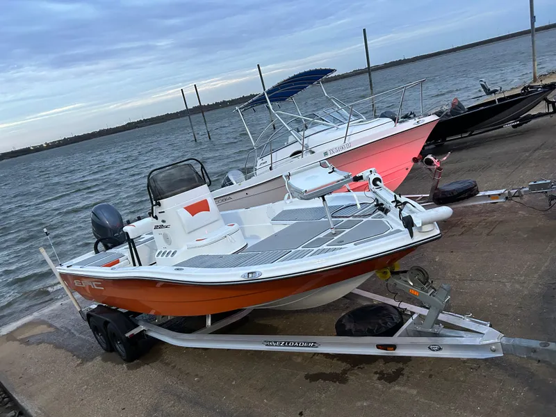 Slide: The Image of 2013 Epic 22 SC boat on trailer by the water, ready for launch. - 37