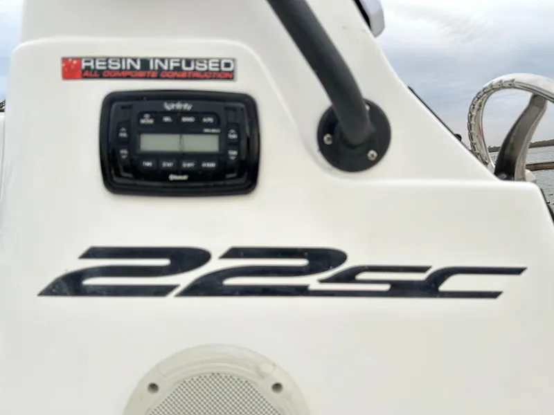 Slide: The Image of 2013 Epic 22 SC boat dashboard with resin infused construction label. - 43