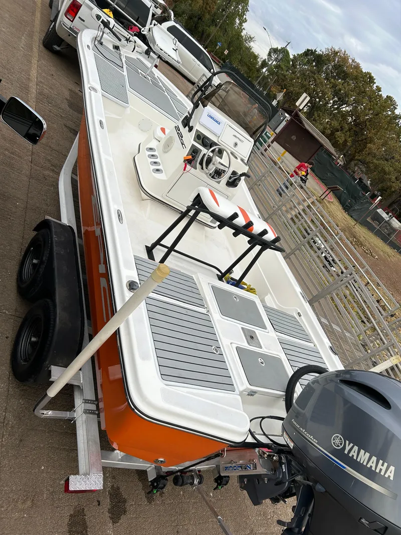 Slide: The Image of 2013 Epic 22 SC boat with Yamaha motor on trailer. - 47