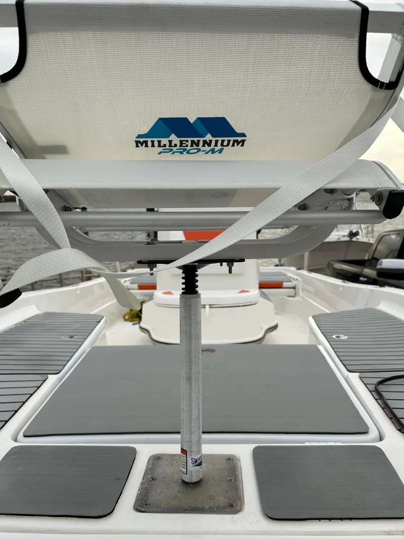 Slide: The Image of 2013 Epic 22 SC boat with Millennium Marine seat, featuring a sleek deck design. - 51