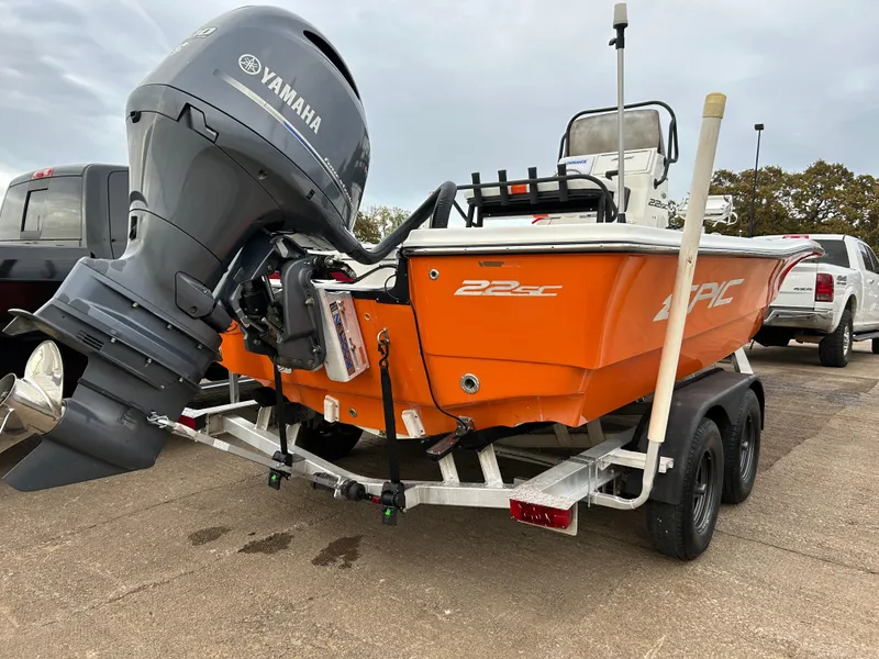 Slide: The Image of 2013 Epic 22 SC boat with Yamaha outboard motor on trailer. - 9