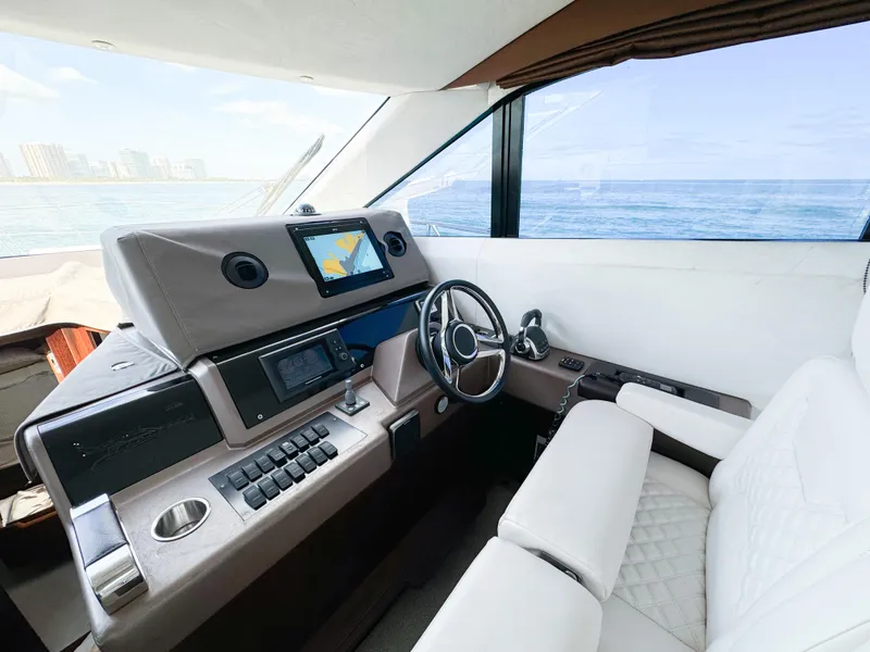 Slide: The Image of Interior helm of 2016 Galeon 420 Fly yacht with modern navigation equipment. - 20