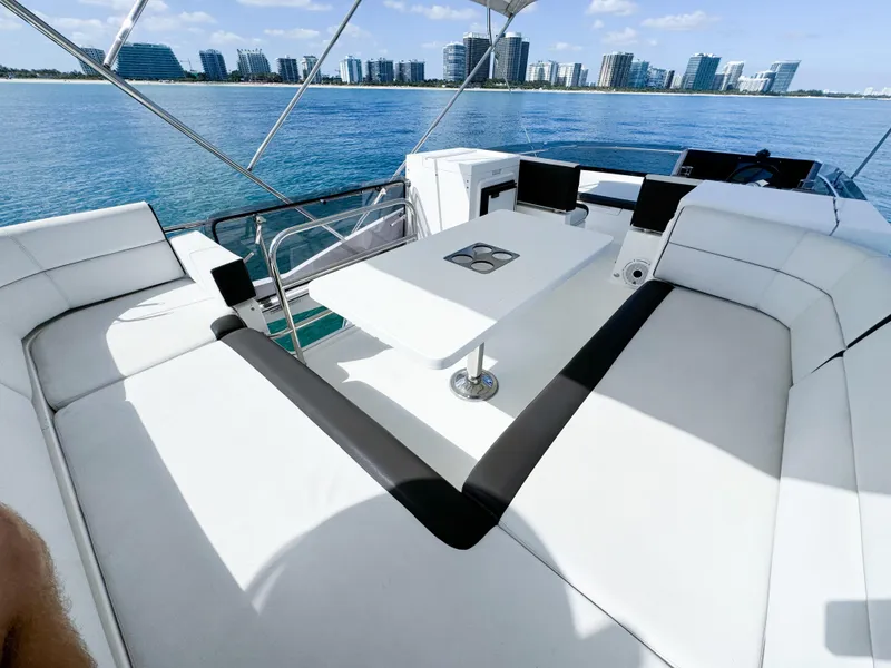 Slide: The Image of Luxurious 2016 Galeon 420 Fly yacht interior with spacious seating and ocean view. - 22