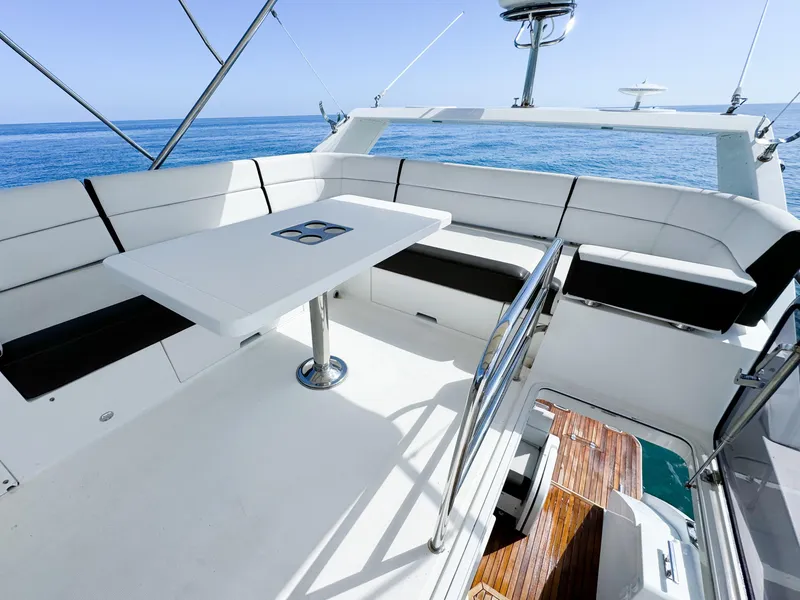 Slide: The Image of Luxurious 2016 Galeon 420 Fly yacht with spacious seating and ocean view. - 23