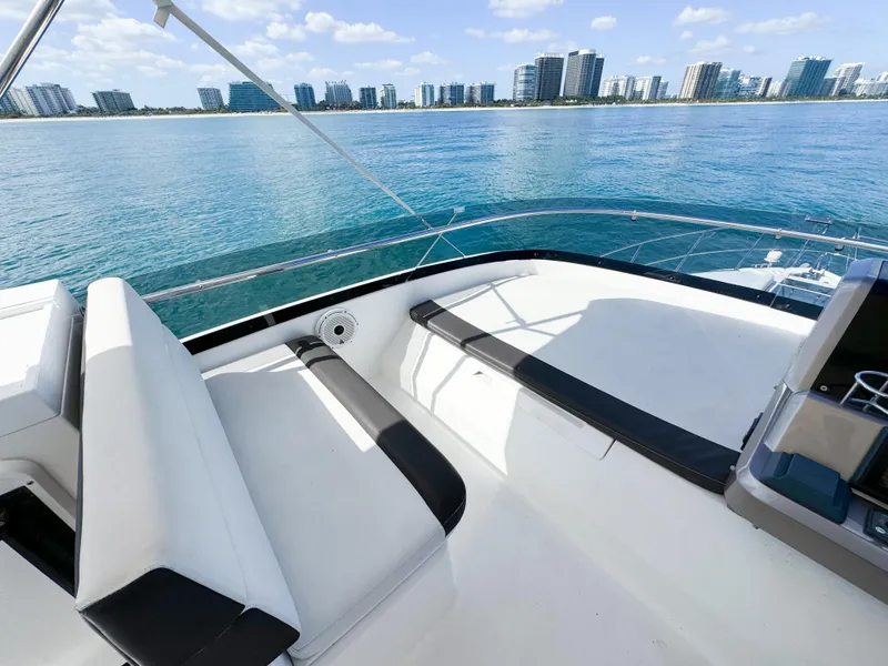 Slide: The Image of Galeon 420 Fly 2016 yacht deck with ocean view and city skyline. - 24