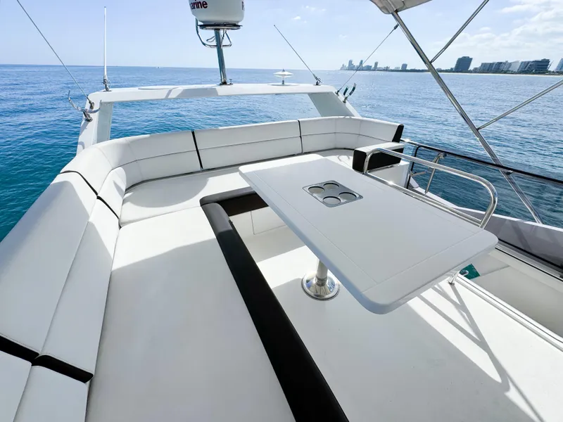 Slide: The Image of Galeon 420 Fly 2016 yacht flybridge with seating and table, ocean view. - 26