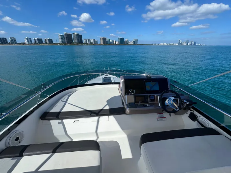 Slide: The Image of Galeon 420 Fly 2016 yacht helm with ocean view and city skyline. - 28