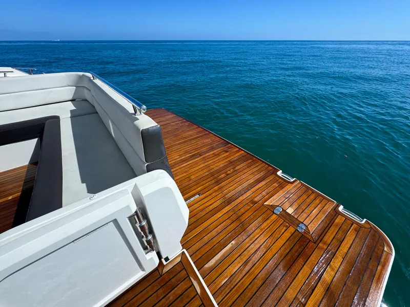 Slide: The Image of Galeon 420 Fly 2016 yacht deck with ocean view, featuring sleek wooden finish. - 30