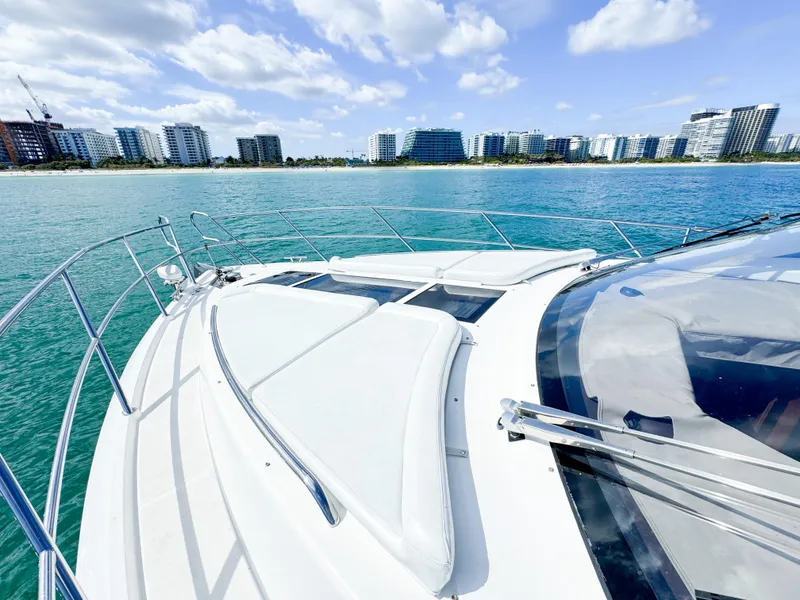 Slide: The Image of Galeon 420 Fly 2016 yacht cruising near modern city skyline. - 31