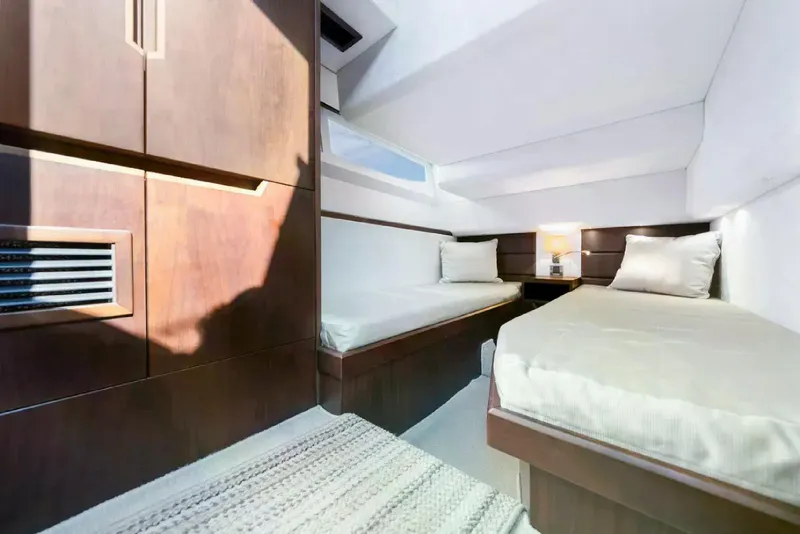 Slide: The Image of Luxurious cabin interior of 2016 Galeon 420 Fly yacht with twin beds. - 37