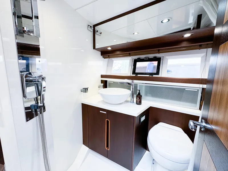 Slide: The Image of Luxurious bathroom in 2016 Galeon 420 Fly yacht with modern fixtures and elegant design. - 38