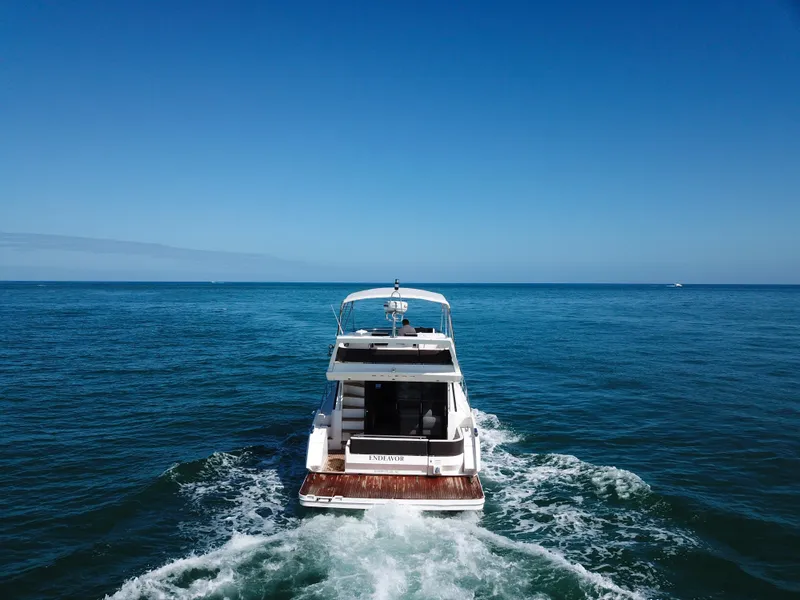 Slide: The Image of Galeon 420 Fly 2016 yacht cruising on open sea under clear blue sky. - 47