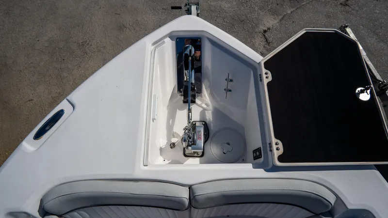 Slide: The Image of 2024 Sea Fox 268 Commander anchor storage compartment, open view. - 10