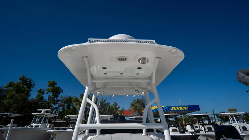 Slide: The Image of 2024 Sea Fox 268 Commander boat under clear blue sky. - 17