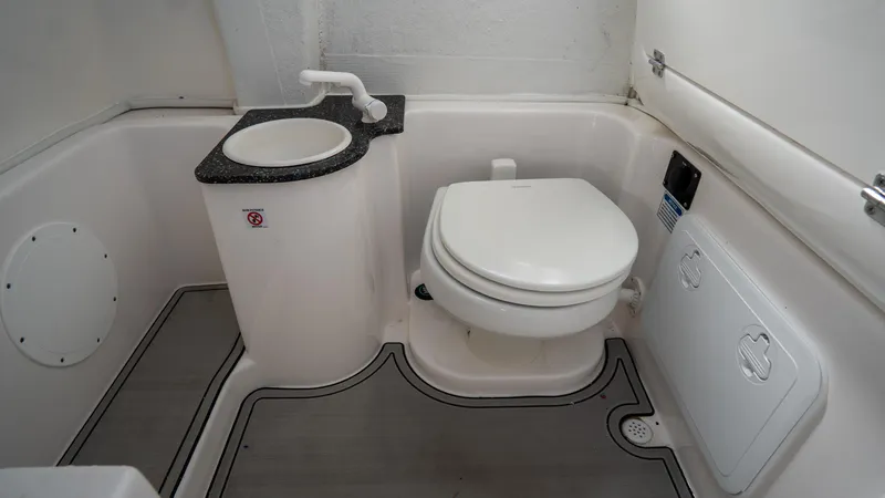 Slide: The Image of 2024 Sea Fox 268 Commander boat bathroom with sink and toilet. - 20
