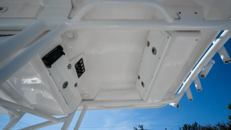 Slide: The Image of 2024 Sea Fox 268 Commander boat interior with storage compartments and rod holders. - 23